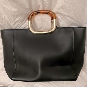 Never used. Small tote.